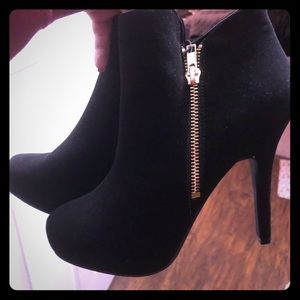 Black suede heeled ankle boots